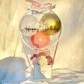 Bobo Balloon Gift Basket – Transparent Balloon Arrangement with Flowers & Ribbons