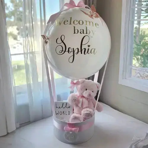 Bobo Balloon Gift Basket – Welcome Baby Transparent Balloon Arrangement with Plush & Baby Décor