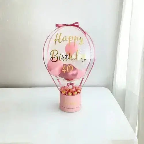 Bobo Balloon Basket – Happy Birthday Transparent Balloon Arrangement with Chocolates & Decorative Base